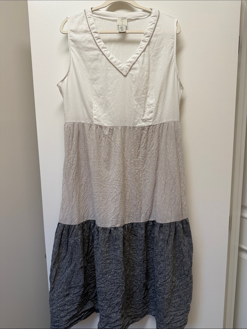 This is a Joie colorblock linen maxi dress featuring a distinctive jeweled Vneck